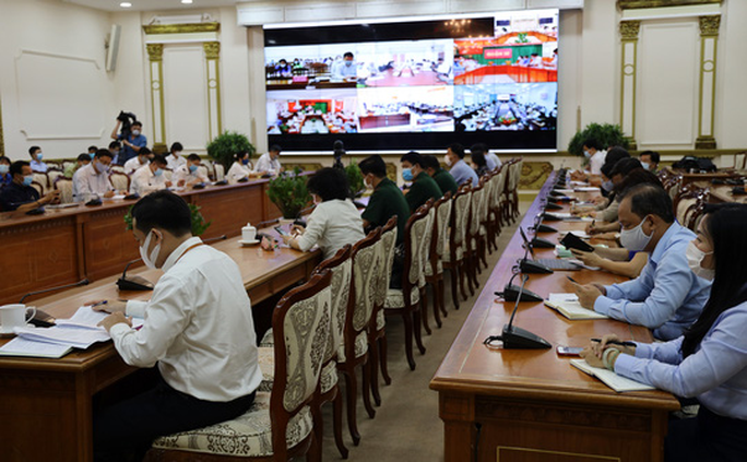 TP HCM nghiên cứu xử phạt hành chính người không đeo khẩu trang nơi công cộng - Ảnh 2. TP HCM nghiên cứu xử phạt hành chính người không đeo khẩu trang nơi công cộng - Ảnh 2.