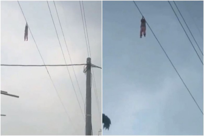 Indonesia: Bé gái treo trên dây cáp điện cao 15 m - Ảnh 1.