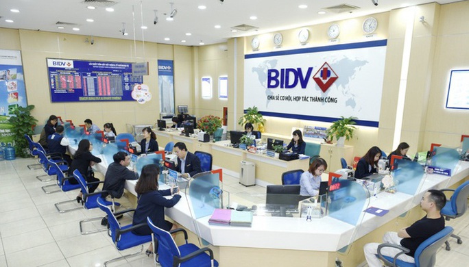 Cá nhân vay tiêu dùng cũng được giảm lãi suất - Ảnh 1.