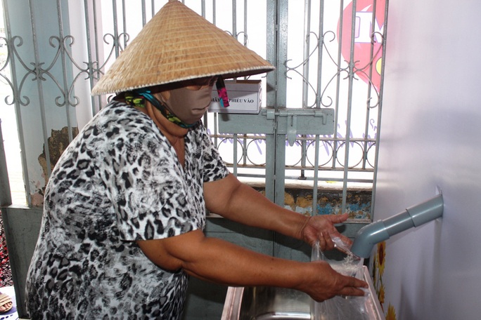 “ATM gạo” giúp mát lòng người nghèo vùng hạn mặn ở Cà Mau, Bạc Liêu và Kiên Giang - Ảnh 21.