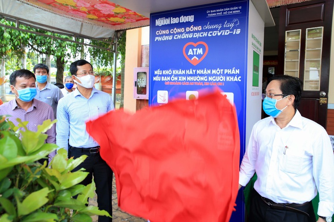 Báo Người Lao Động khai trương ATM thực phẩm thứ 2 - Ảnh 1. Báo Người Lao Động khai trương ATM thực phẩm thứ 2 - Ảnh 1.
