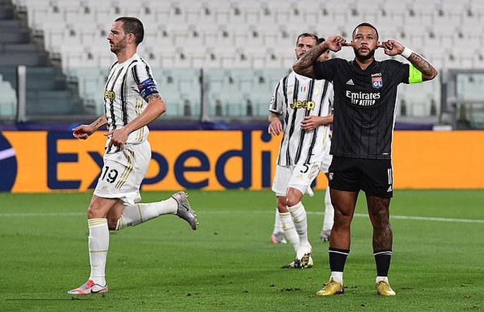Ronaldo lập cú đúp, Juventus vẫn bị hất văng khỏi Champions League - Ảnh 2.