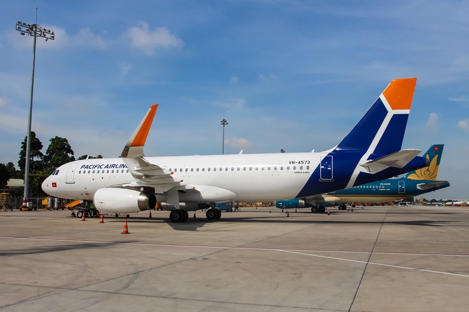 Lần đầu lộ diện màu sơn mới của máy bay và trang phục tiếp viên Pacific Airlines - Ảnh 1.