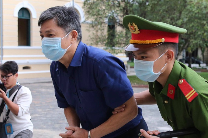 Hình ảnh ông Nguyễn Thành Tài và bà chủ Công ty Hoa Tháng Năm ở phiên tòa sáng 17-9 - Ảnh 2.