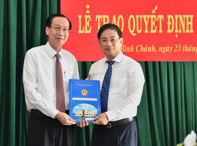 UBND TP HCM phê chuẩn nhân sự lãnh đạo tại quận 4 và huyện Bình Chánh - Ảnh 1.