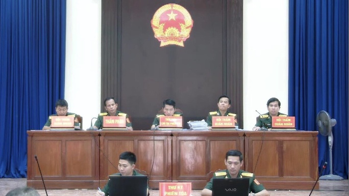 Đồng phạm phản bác Lê Quang Hiếu Hùng tại Tòa án Quân sự Quân khu 7 - Ảnh 2.