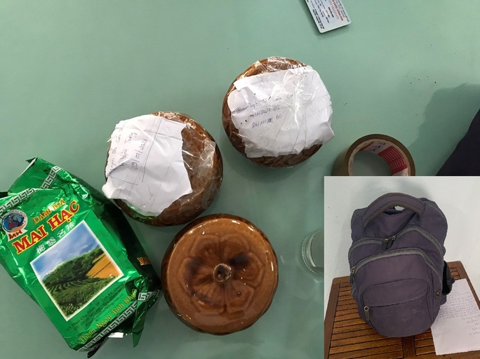 Đà Nẵng: Hai hũ gốm nghi đựng tro cốt bị bỏ quên tại quán ăn ven đường - Ảnh 1.