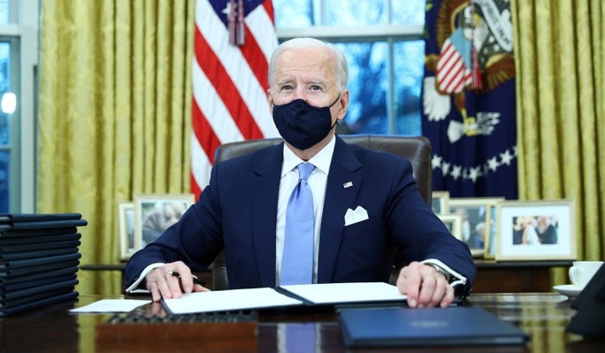 Sau lễ nhậm chức, ông Biden hủy bỏ nhiều sắc lệnh dưới thời ông Trump - Ảnh 2.
