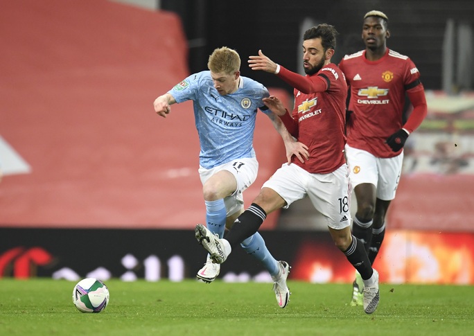 Lập cú đúp ở Old Trafford, Man City đoạt vé chung kết League Cup - Ảnh 1.