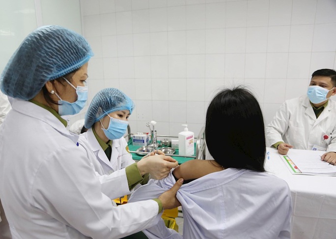 Thử nghiệm vắc-xin Covid-19 giai đoạn 2 tại Hà Nội và Long An - Ảnh 1.