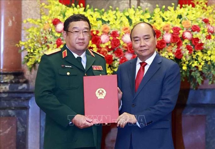 Chủ tịch nước Nguyễn Xuân Phúc trao Quyết định thăng quân hàm Thượng tướng - Ảnh 1.