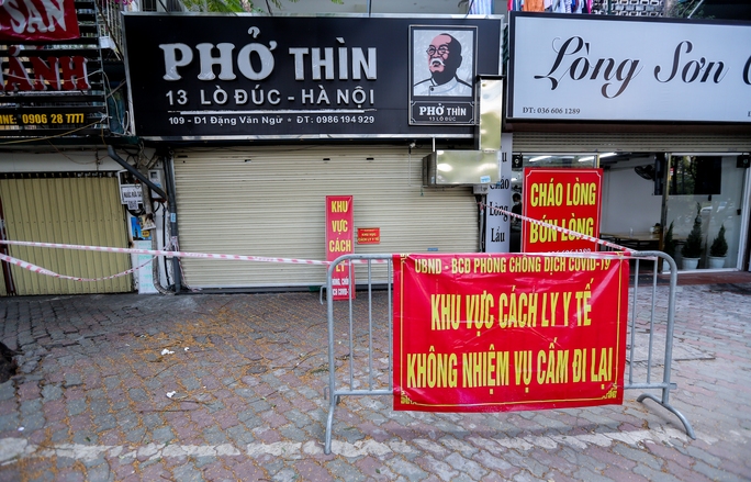 Nhiều chủ cửa hàng ở Hà Nội ngậm ngùi treo biển bán hàng mang về - Ảnh 11.
