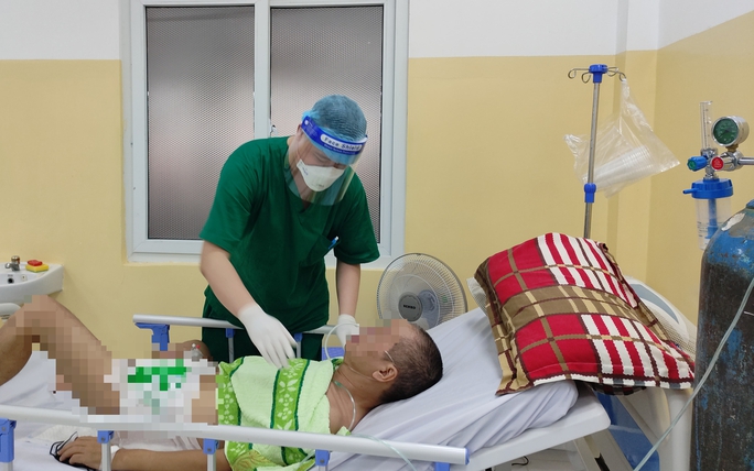 Bệnh viện 1A lập đường dây nóng tư vấn miễn phí cho F0 tại nhà - Ảnh 1.