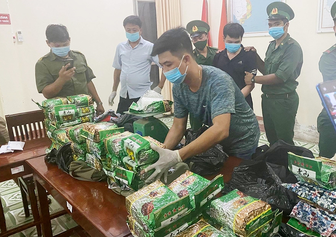 Án tử hình cho 2 kẻ vận chuyển gần 40 kg ma túy từ Campuchia về TP HCM - Ảnh 1.
