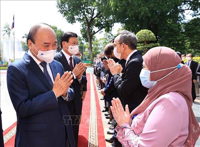 Chủ tịch nước chủ trì lễ đón Tổng Bí thư, Chủ tịch nước Lào - Ảnh 6.