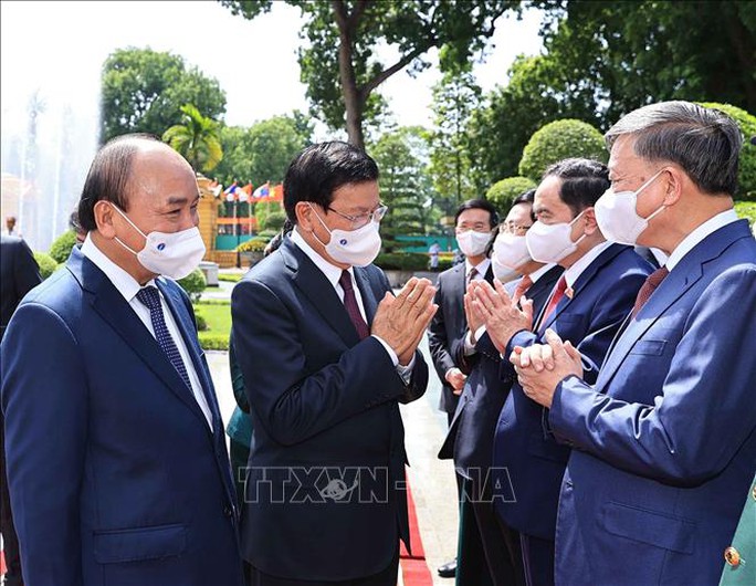 Chủ tịch nước chủ trì lễ đón Tổng Bí thư, Chủ tịch nước Lào - Ảnh 7.