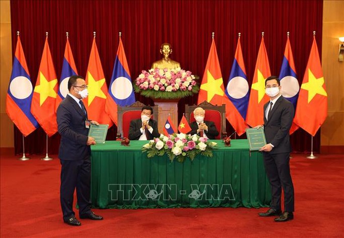 Tổng Bí thư Nguyễn Phú Trọng và Tổng Bí thư, Chủ tịch nước Lào hội đàm - Ảnh 8.