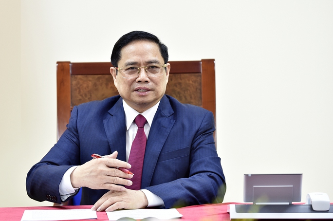 Thủ tướng Việt Nam đề nghị Trung Quốc hỗ trợ chiến lược vắc-xin Covid-19 - Ảnh 1.
