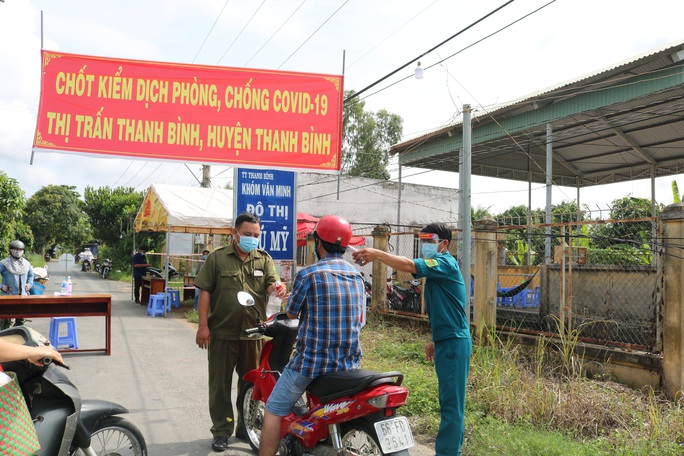 Chùm ảnh: Vắng lặng ở tỉnh có số ca mắc Covid-19 nhiều nhất ĐBSCL - Ảnh 11.