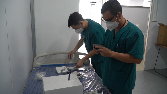 1 bác sĩ, 2 điều dưỡng sẽ theo dõi 50-100 F0 không triệu chứng tại khu cách ly - Ảnh 2. 1 bác sĩ, 2 điều dưỡng sẽ theo dõi 50-100 F0 không triệu chứng tại khu cách ly - Ảnh 2.