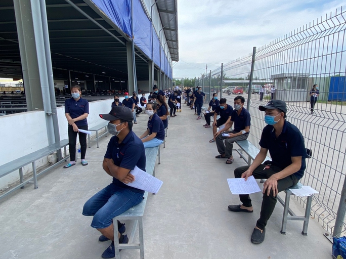 Giữ việc làm cho công nhân - Ảnh 1.