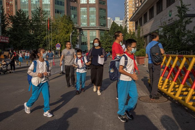 Trung Quốc quy định học phí học thêm - Ảnh 1.