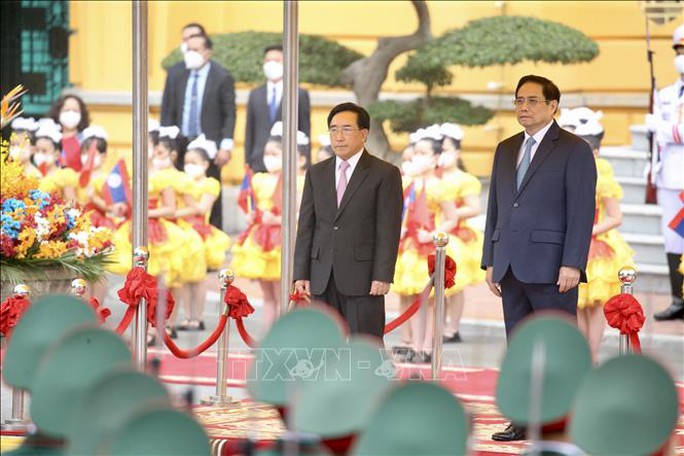 Thủ tướng Phạm Minh Chính đón Thủ tướng Lào thăm chính thức Việt Nam - Ảnh 4.