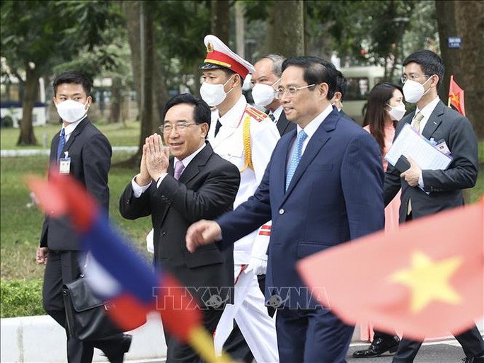 Thủ tướng Phạm Minh Chính đón Thủ tướng Lào thăm chính thức Việt Nam - Ảnh 10.