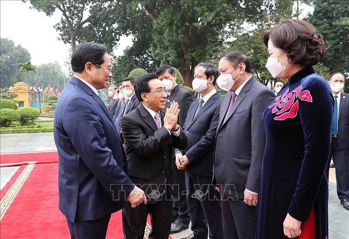 Thủ tướng Phạm Minh Chính đón Thủ tướng Lào thăm chính thức Việt Nam - Ảnh 7.