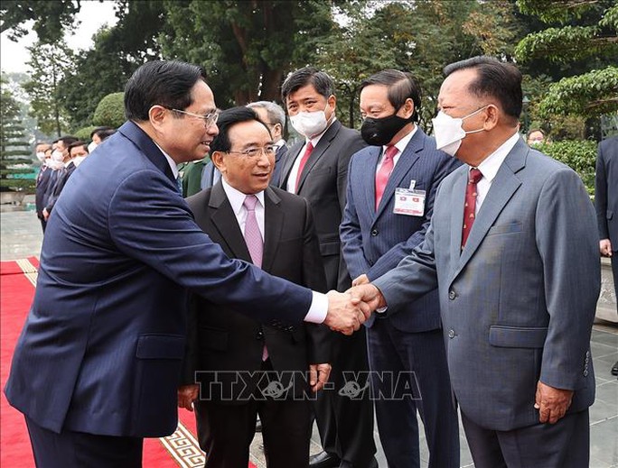 Thủ tướng Phạm Minh Chính đón Thủ tướng Lào thăm chính thức Việt Nam - Ảnh 8.