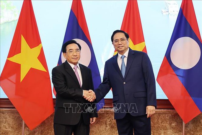 Thủ tướng Phạm Minh Chính đón Thủ tướng Lào thăm chính thức Việt Nam - Ảnh 12.