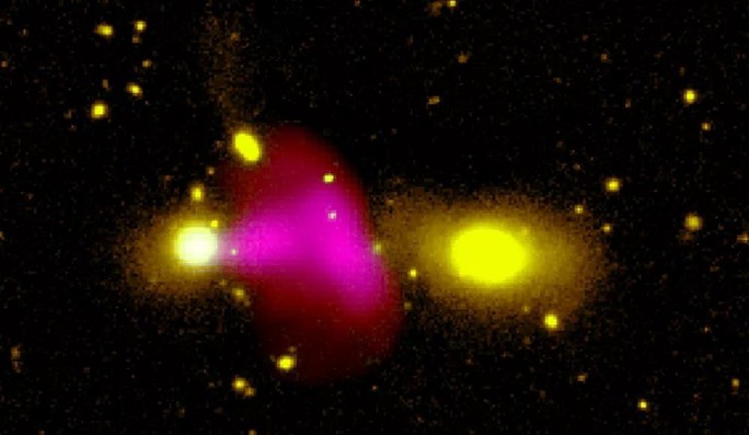 Rùng rợn quái vật vũ trụ bắn tia plasma làm nổ tung thiên hà khác - Ảnh 1.