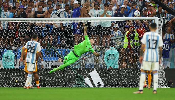 Thắng nghẹt thở trong loạt penalty, Argentina đoạt vé vào Bán kết - Ảnh 11.