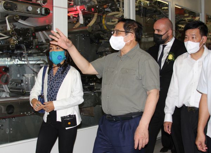 Chùm ảnh: Thủ tướng Phạm Minh Chính tham quan nhà máy sản xuất tã trẻ em tại KCN Becamex Bình Phước - Ảnh 3.