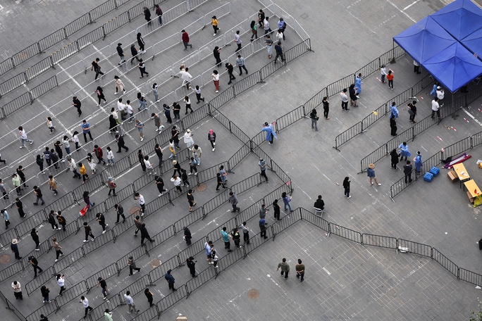 Double outbreak in China's top 2 cities - Photo 1.