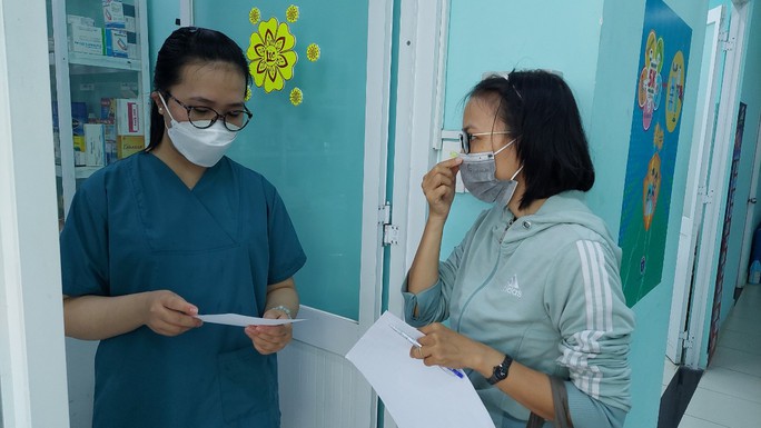 TP HCM thay đổi gì về hướng dẫn chăm sóc F0 tại nhà? - Ảnh 1.