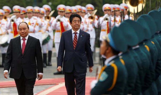 Những hình ảnh đáng nhớ của cố Thủ tướng Abe Shinzo và Lãnh đạo Việt Nam - Ảnh 4.