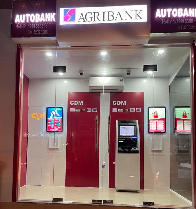 Agribank Cần Thơ II đưa vào hoạt động máy gửi, rút tiền tự động - Ảnh 1.