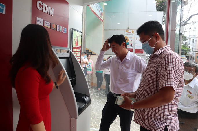 Agribank Cần Thơ II đưa vào hoạt động máy gửi, rút tiền tự động - Ảnh 3.