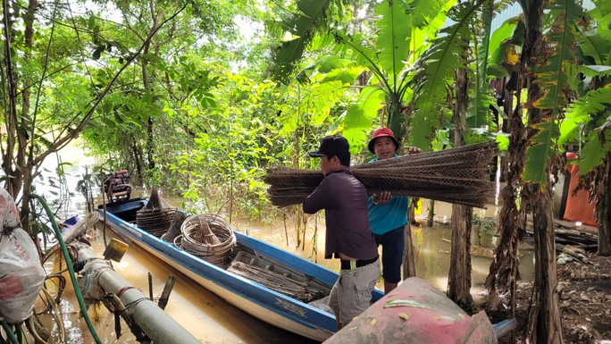 Đánh bắt đồng xa mùa nước nổi ở miền Tây - Ảnh 13.