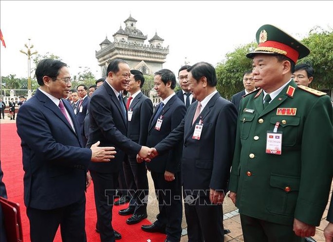 Thủ tướng Lào Sonexay Siphandone đón, hội đàm với Thủ tướng Phạm Minh Chính - Ảnh 5.