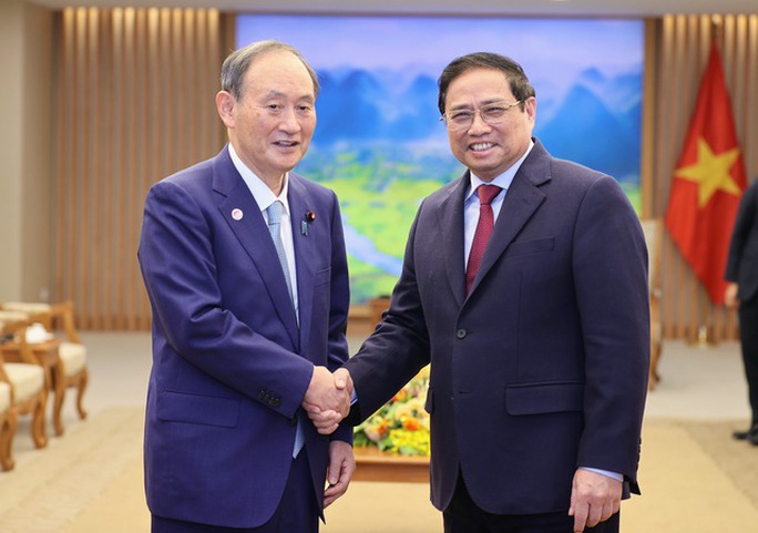 Thủ tướng Phạm Minh Chính tiếp nguyên Thủ tướng Nhật Bản Suga Yoshihide - Ảnh 1.