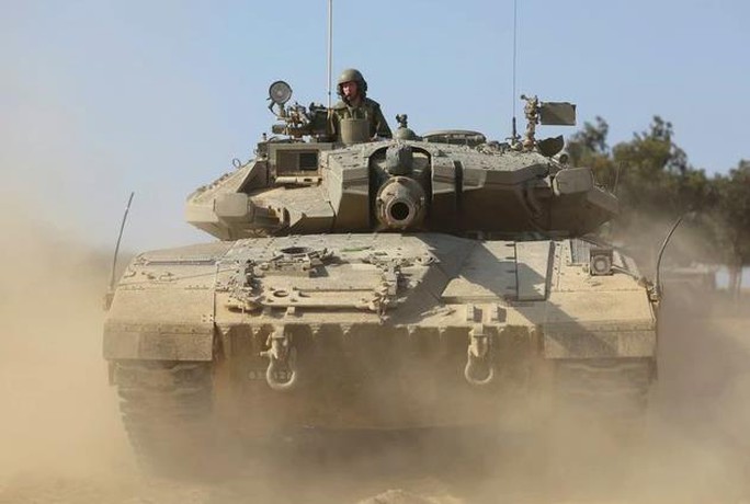 Israel đến cửa ngõ của TP Gaza, đụng độ dữ dội - Ảnh 1. Israel đến cửa ngõ của TP Gaza, đụng độ dữ dội - Ảnh 1.