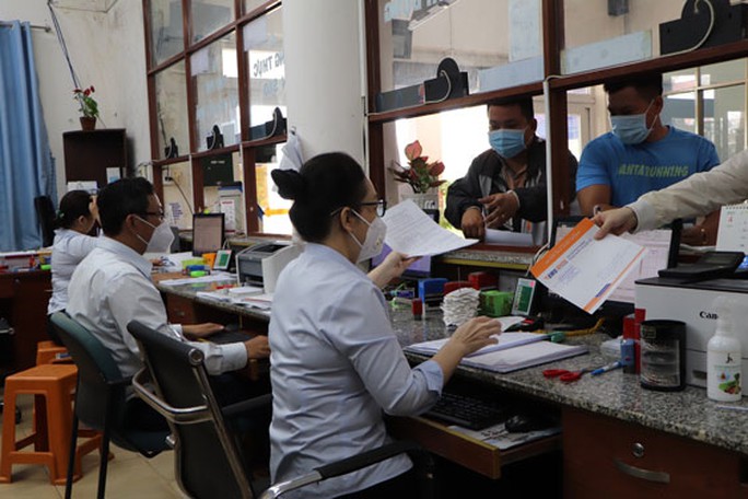 Giải tỏa áp lực cho cán bộ xã, phường - Ảnh 1.