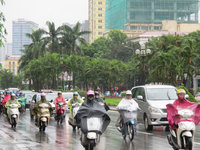 Không khí lạnh tràn về, Bắc Bộ và Trung Bộ có mưa - Ảnh 1.