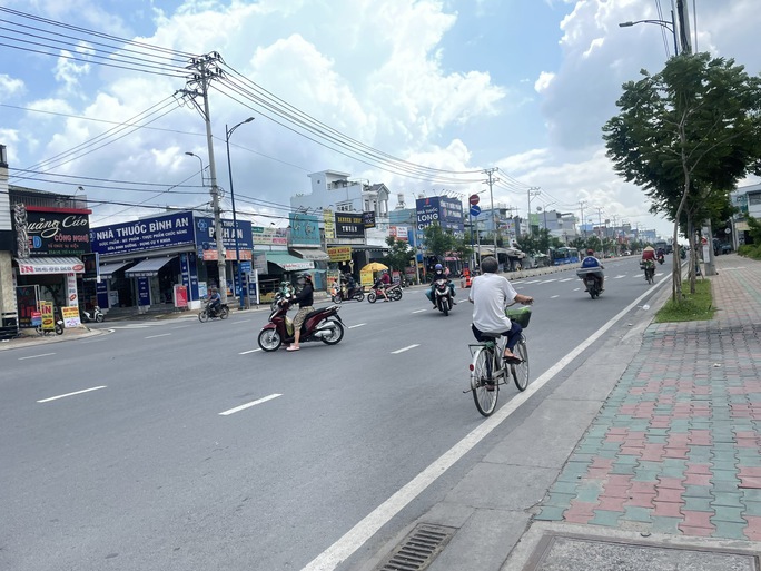 TP HCM: Đường Đặng Thúc Vịnh nguy cơ trở thành tuyến đường đen? - Ảnh 6.