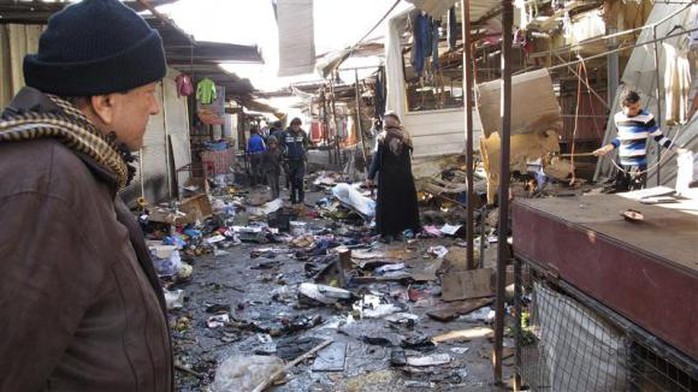 Một cuộc tấn công bom tại khu chợ quận Doura,  thủ đô Bagdad. Ảnh: Reuters