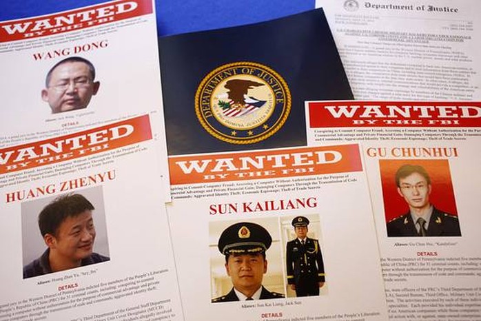 Photo: The U.S. Justice Department announced charges against five individuals in the Chinese military, accusing them of hacking U.S. companies for trade secrets. http://on.wsj.com/1mNGdQ5  Pictured: FBI posters related to the case (Credit: AP)