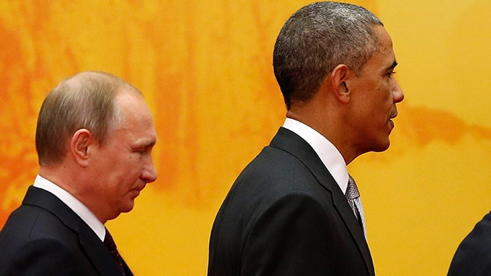 Tổng thống Putin (trái) và Tổng thống Obama (phải) luôn tránh ánh mắt của nhau tại APEC. Ảnh: Reuters