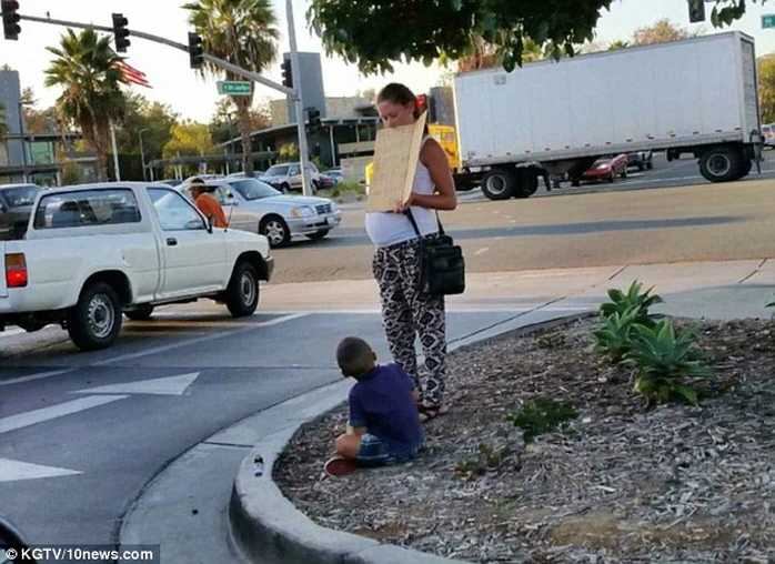 Begging: Shopper Melissa Smith, from San Diego, California, had witnessed this expectant mother and her child begging for money outside the citys Eastlake Village Center every weekend for the past two weeks